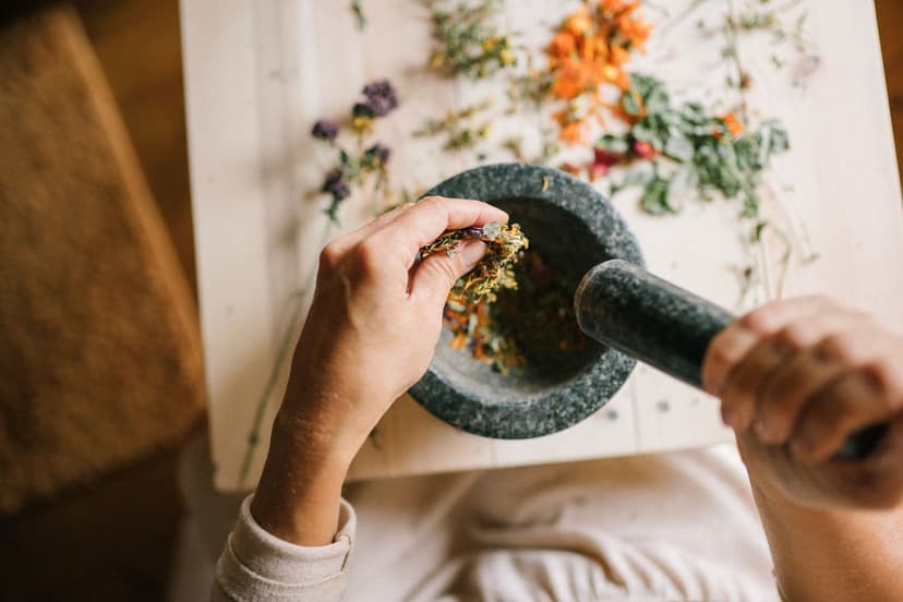 Grinding herbs with a mortar and pestle